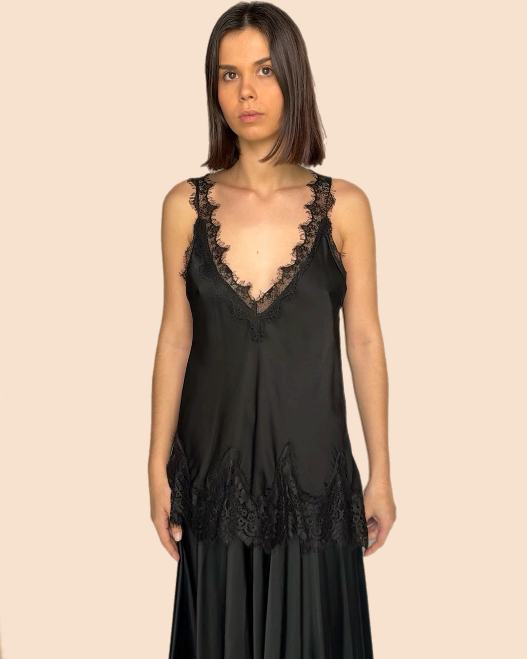Lace-trimmed black camisole top