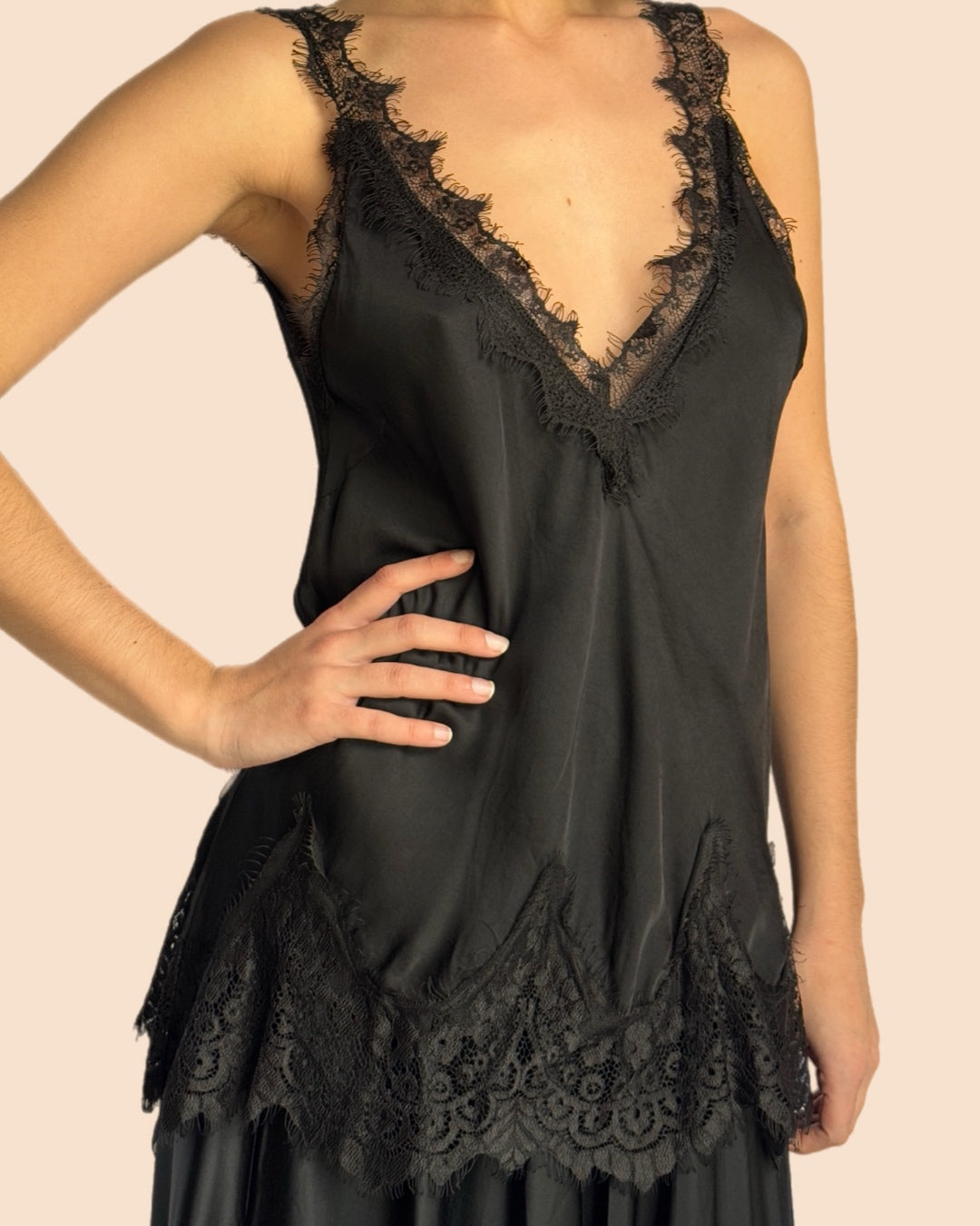 Lace-trimmed black camisole top