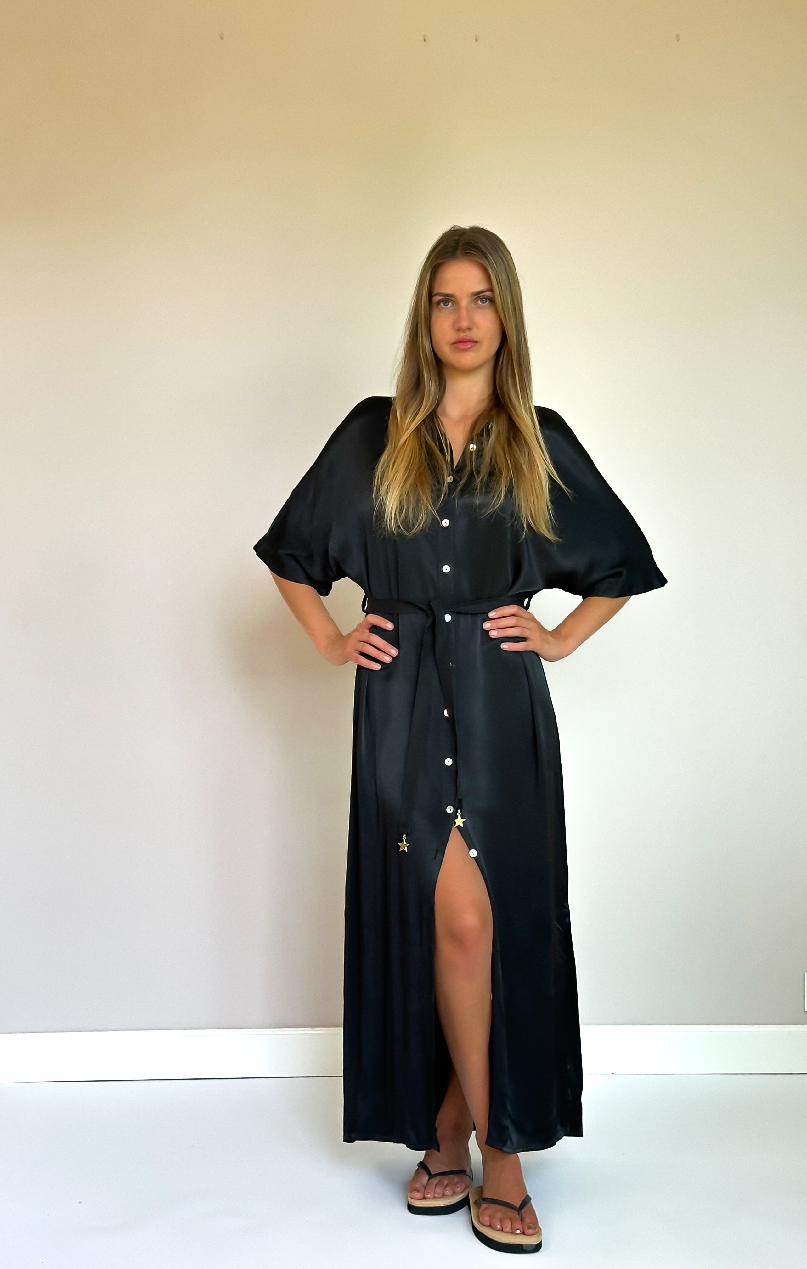 Flowing black viscose dress with a slim belt