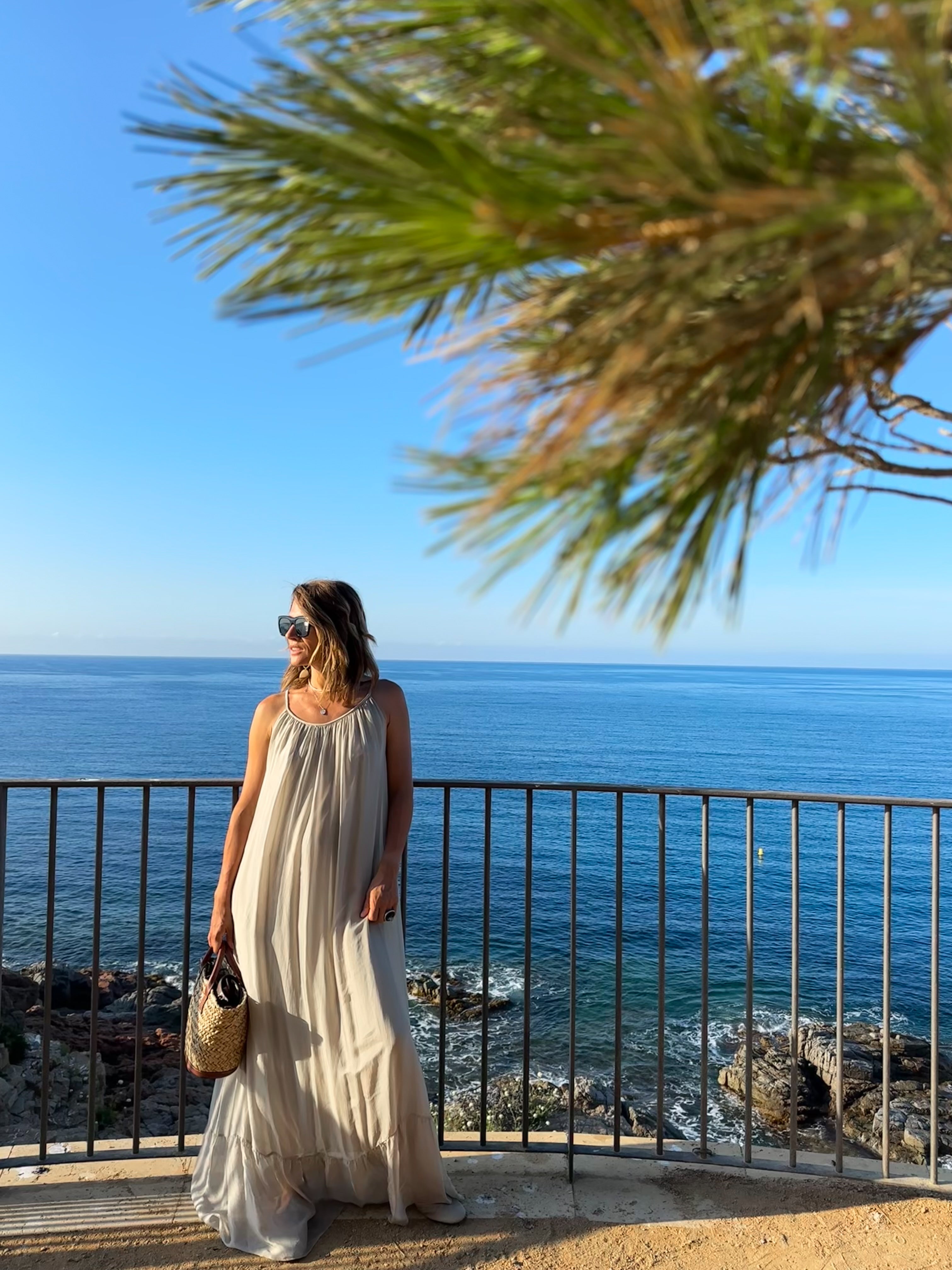 Flowing silk maxi dress with sheer lightweight cardigan