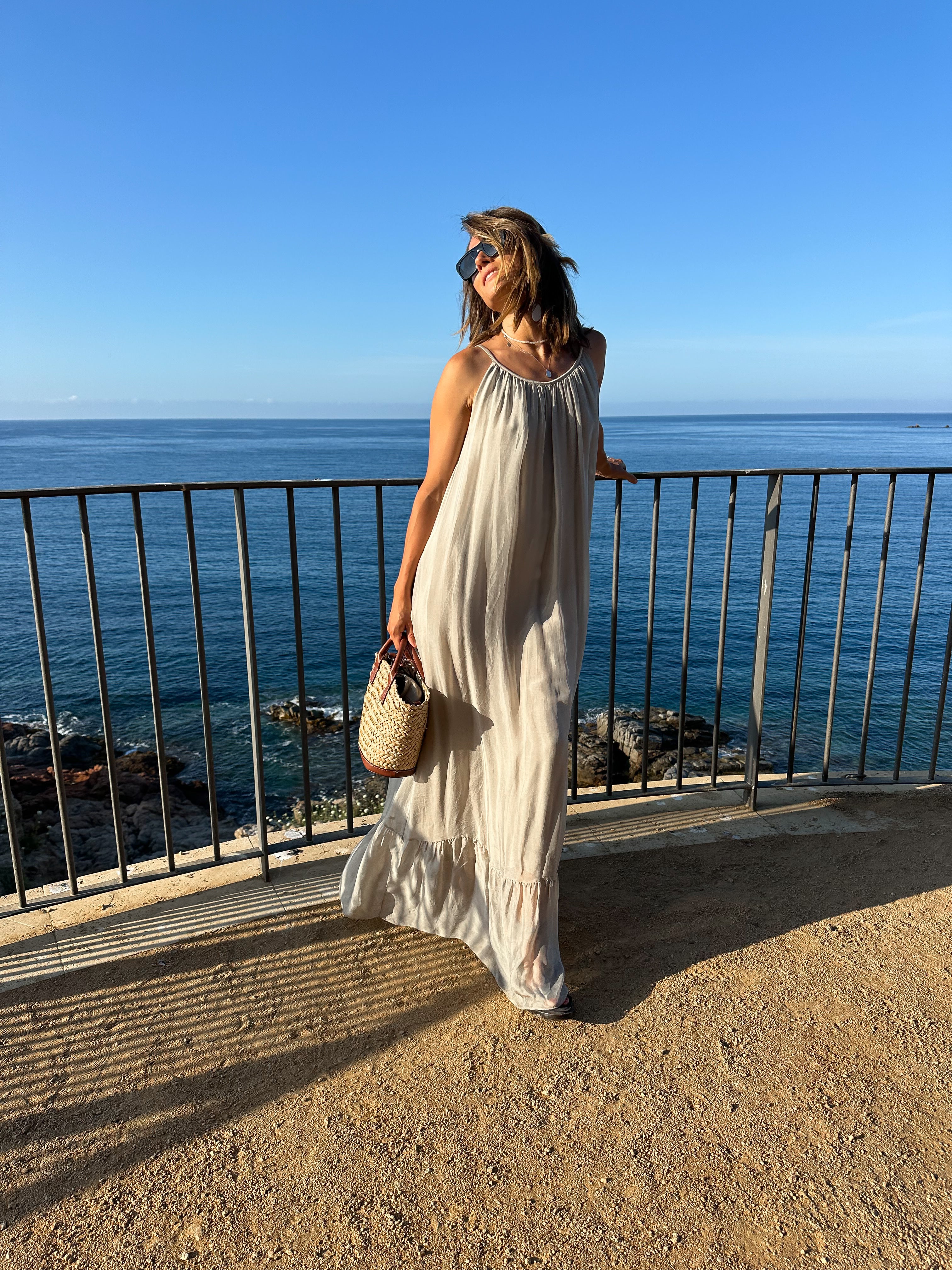 Flowing silk maxi dress with sheer lightweight cardigan